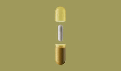 AM-02 Energy and Focus bottle on a warm yellow background