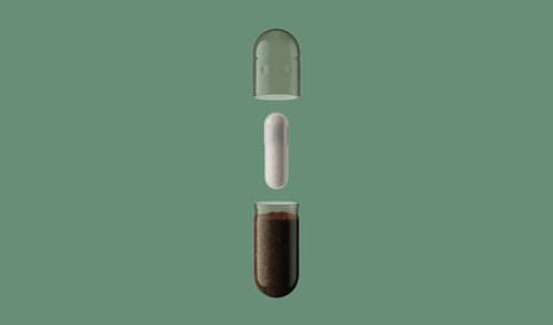 Capsule with a liquid inside on a green background